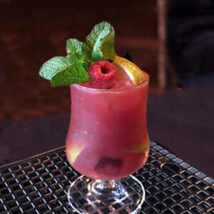 Raspberry Cocktail with Mint Edible Leaves