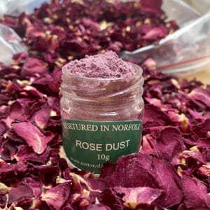 Rose Dust surrounded by Rose petals