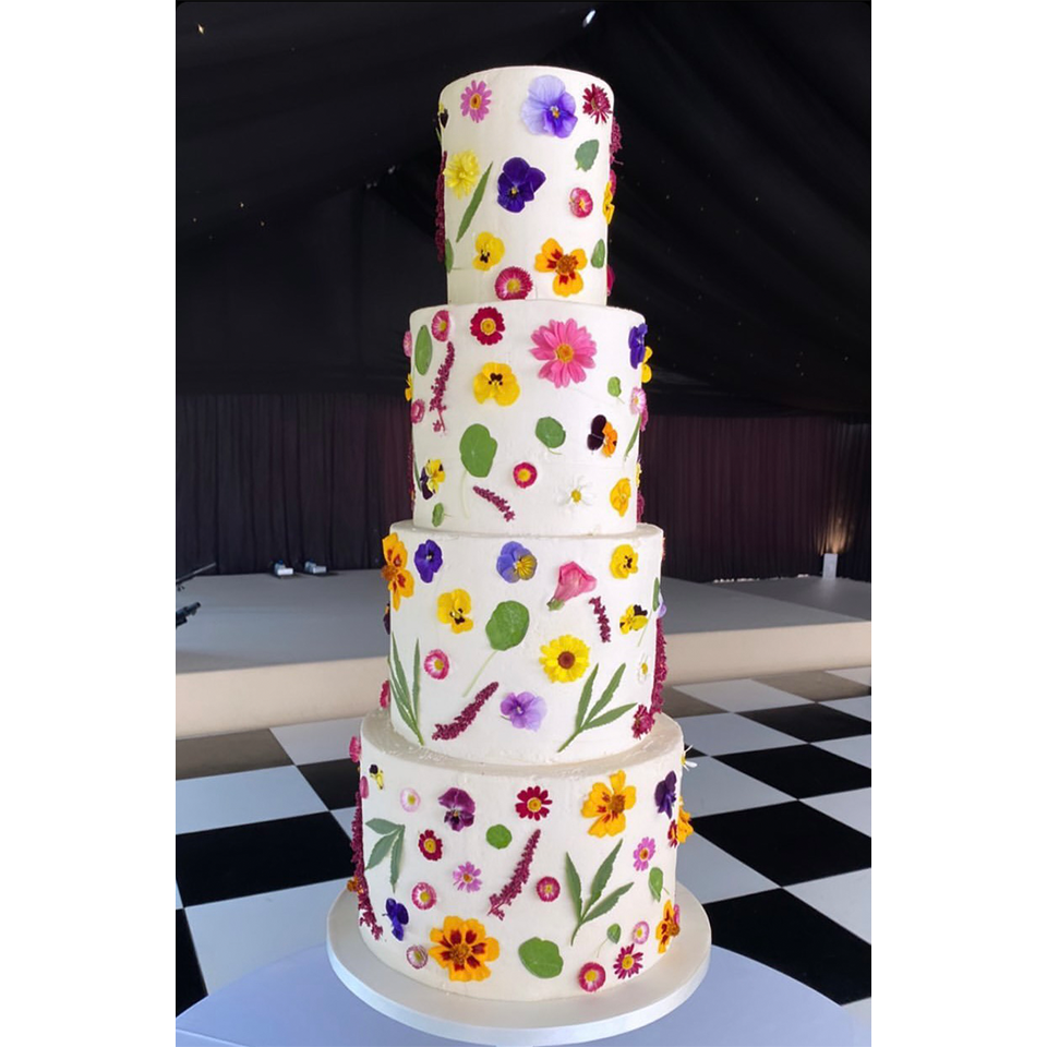 Decorating Cakes With Edible Flowers Nurtured in Norfolk