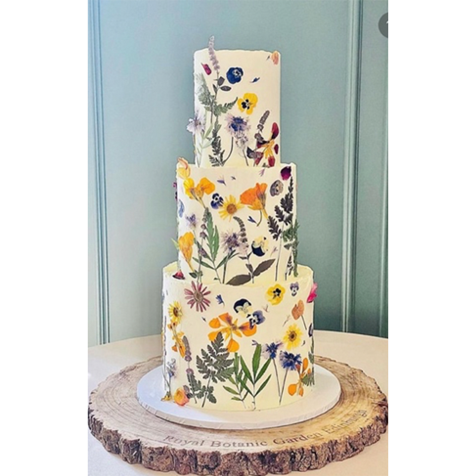 Decorating Cakes With Edible Flowers Nurtured in Norfolk