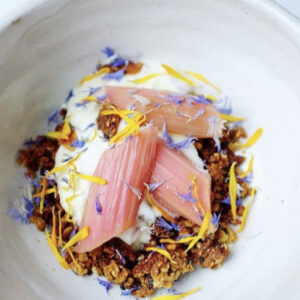 Granola garnished with dried edible flowers